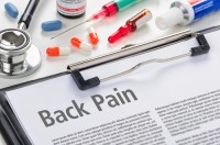 Should I play golf with a sore back?